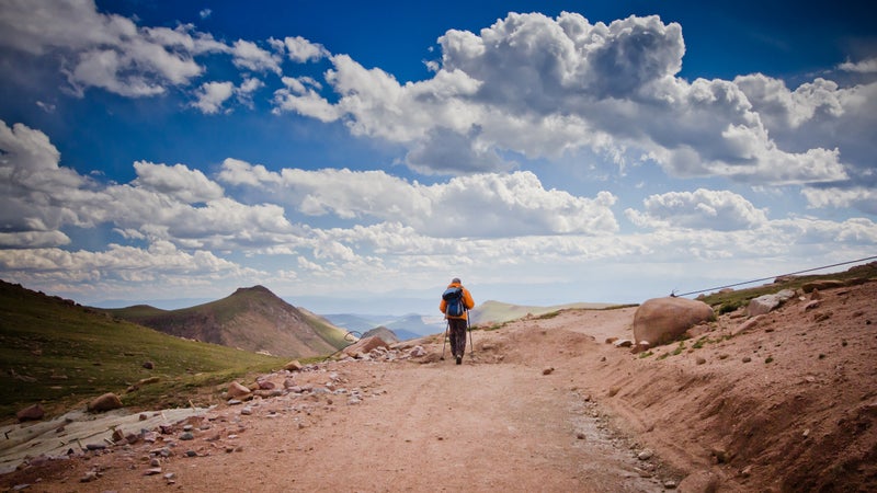Man hiking in the mountain alone