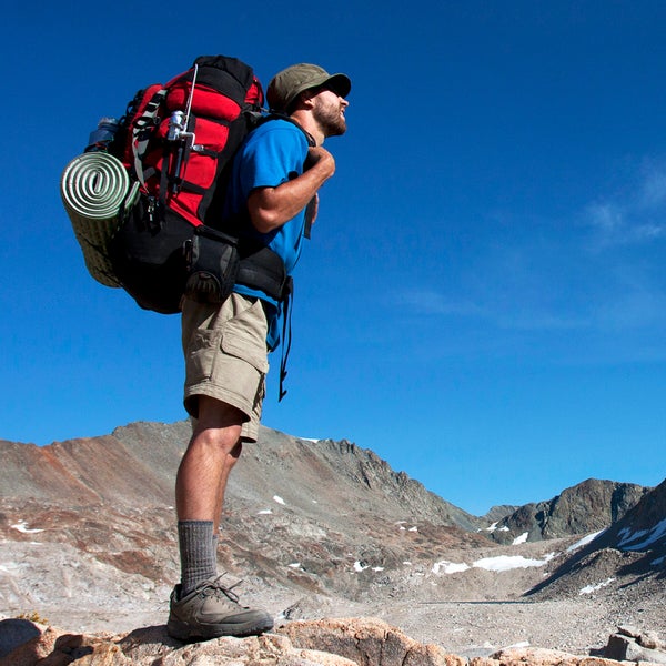 Man backpacking in the wild