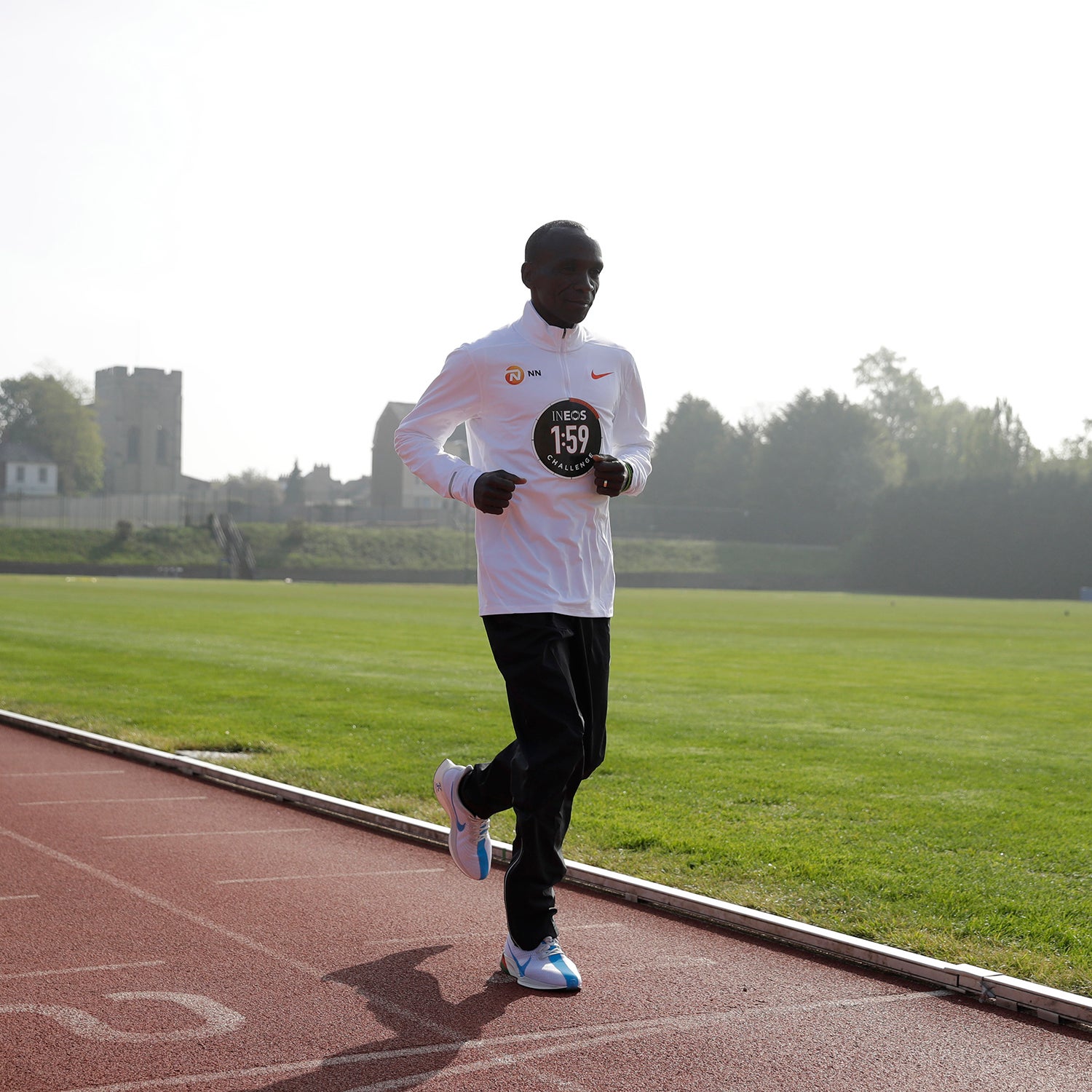 Eliud Kipchoge crosses the finish line at the Iffley Road Track in Oxford, England, where Roger Bannister broke the four minute mile barrier in 1954.