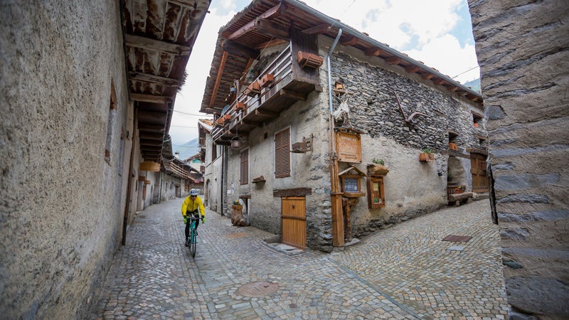 The descent from Colle dell’Agnello, which leads from France back into Italy, passes through quiet, cobbled Piedmontese mountain towns like Chianale.