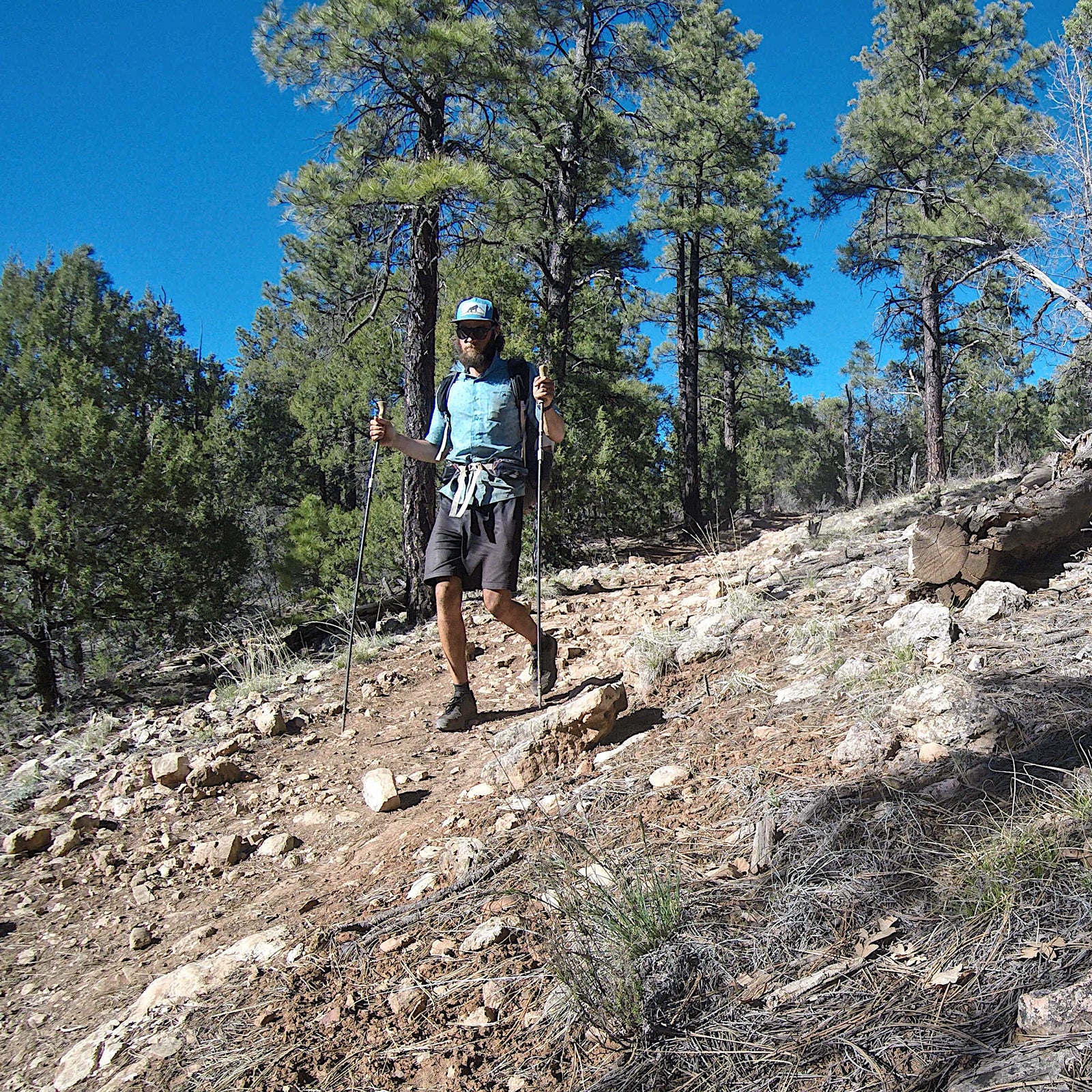 Garmire calls himself a thru-hiker, but he operates at the speed of an Olympian, gracefully running over scree fields and ice chutes, breaking records and accomplishing feats few others can claim.