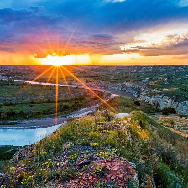 Sunrise over the terrain at North Dakota's Theodore Roosevelt National Park.