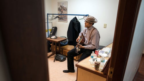 Dom Flemons warms up backstage before at the National Cowboy Poetry Gathering. Flemons said the community of annual attendees has been incredibly supportive of his 2018 album