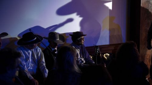 Flemons waits to take the stage at this year's gathering alongside fellow performers and poets. 2020 marked the fourth year he's performed in Elko.