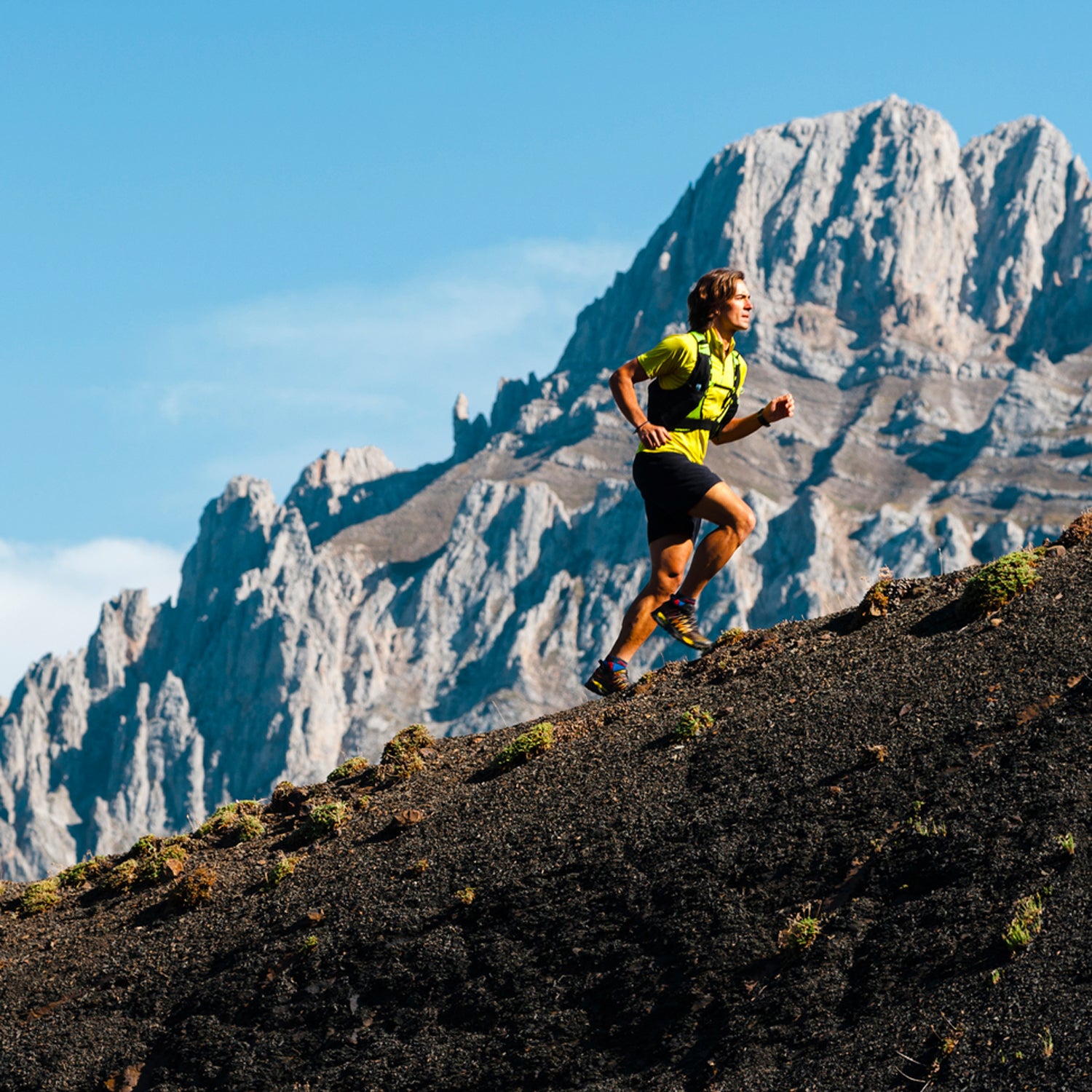 Trail Runner Running Uphill In Collado Jermoso, Leon, Spain