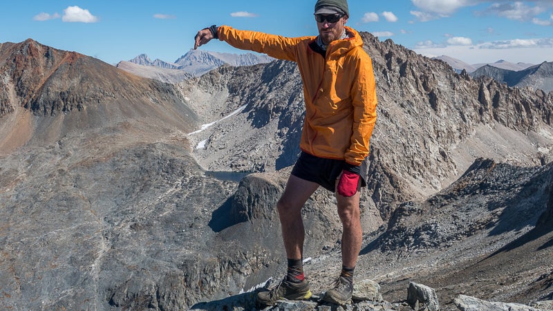 Justin Simoni wearing the Akyra on Copper Mine Peak, one of the highest points on the Kings Canyon High Basin Route in California, looking across the Sierra Nevada toward Mount Whitney.