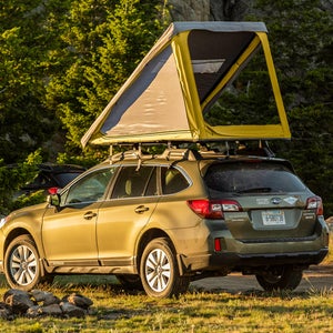 This Subaru Outback's dynamic roof load limit is 165 pounds. Coming in under half that weight, you'll barely be able to feel the difference with a SuperLite mounted up there.