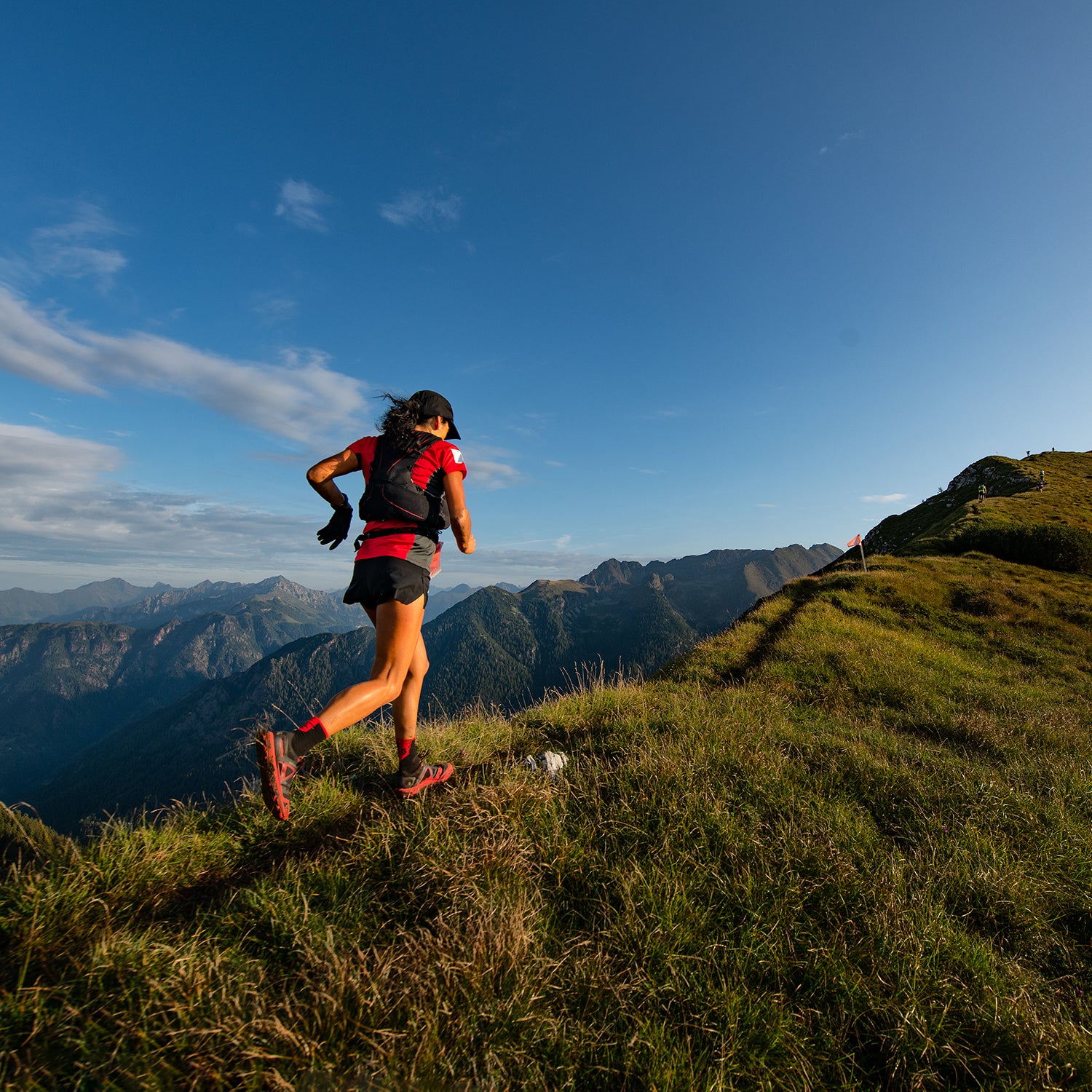 Sporty mountain woman rides in trail during endurance trail