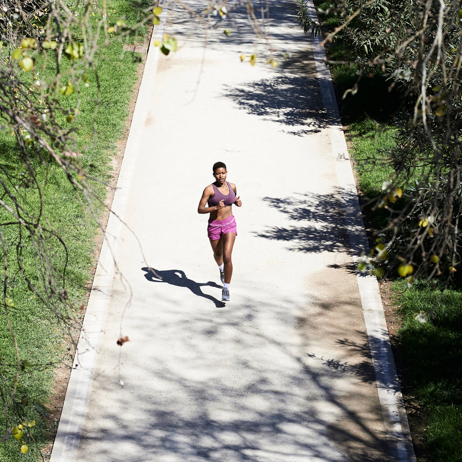 Female Runner In Park.