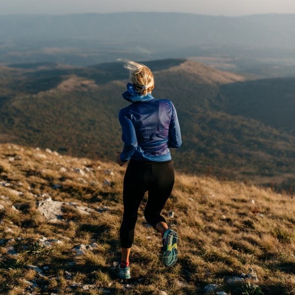 Woman Runner In Nature