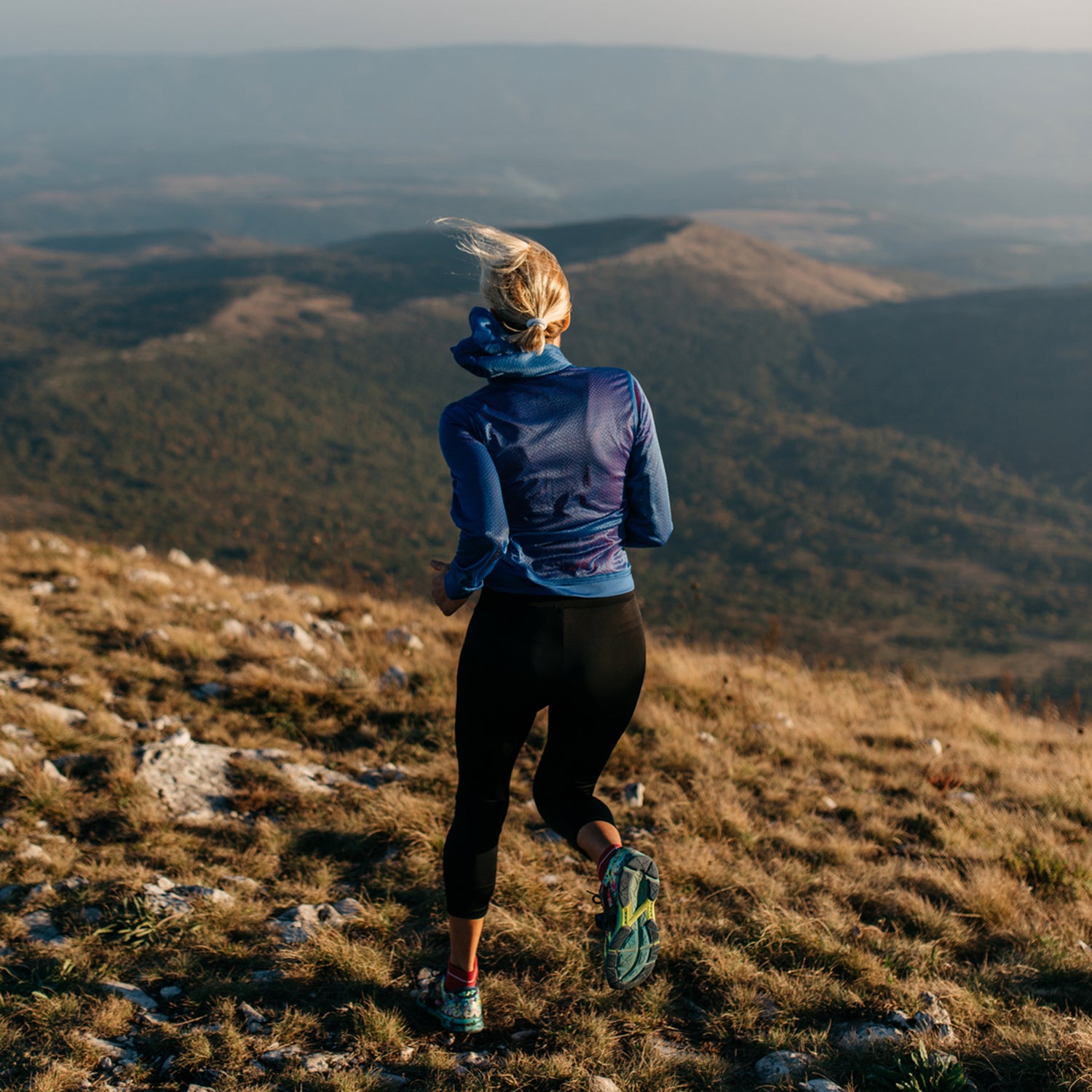 Woman Runner In Nature