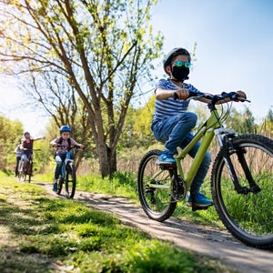 Family enjoying a bike trip during COVID-19 pandemic