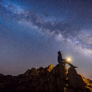 Fed up with packed trails and parking lots, small groups of people have begun to summit in the dark.
