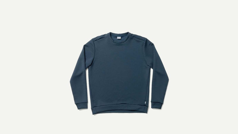 This looks like a normal crewneck sweater, but it’s made from Polartec Power Air, a fleece material that sheds few fibers and moves easily when layered under other garments.