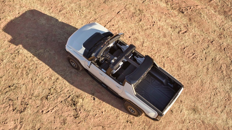 The transparent glass roof panels are removable, and stow in the frunk.
