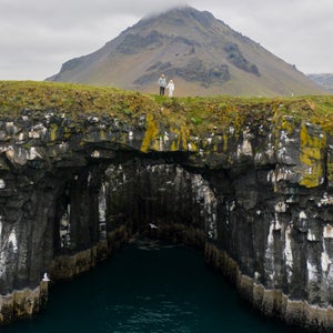Elli Thor and his daughter, Unnúr, atop an oceanside volcanic arch in Iceland. After walking away from kayaking, a newfound passion for surfing and the birth of his daughter gave Elli a new perspective worth living for.