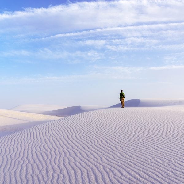 The man at the deserts landscape