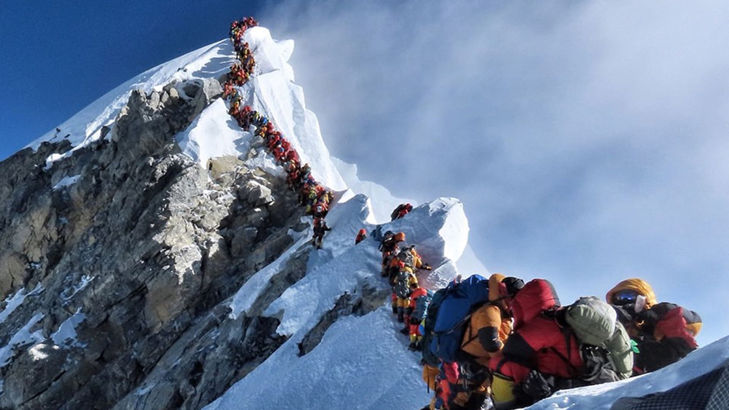 Nirmal Purja’s photo of a line of climbers on Everest’s summit ridge went viral in 2019.