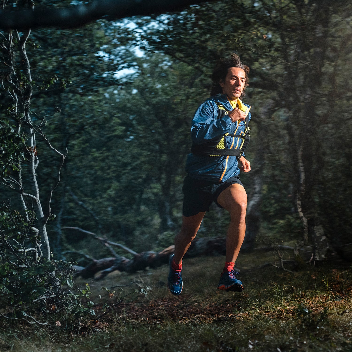 Front view of a ultra trail runer running on a forest close to Collado Jermoso, Leon, Spain