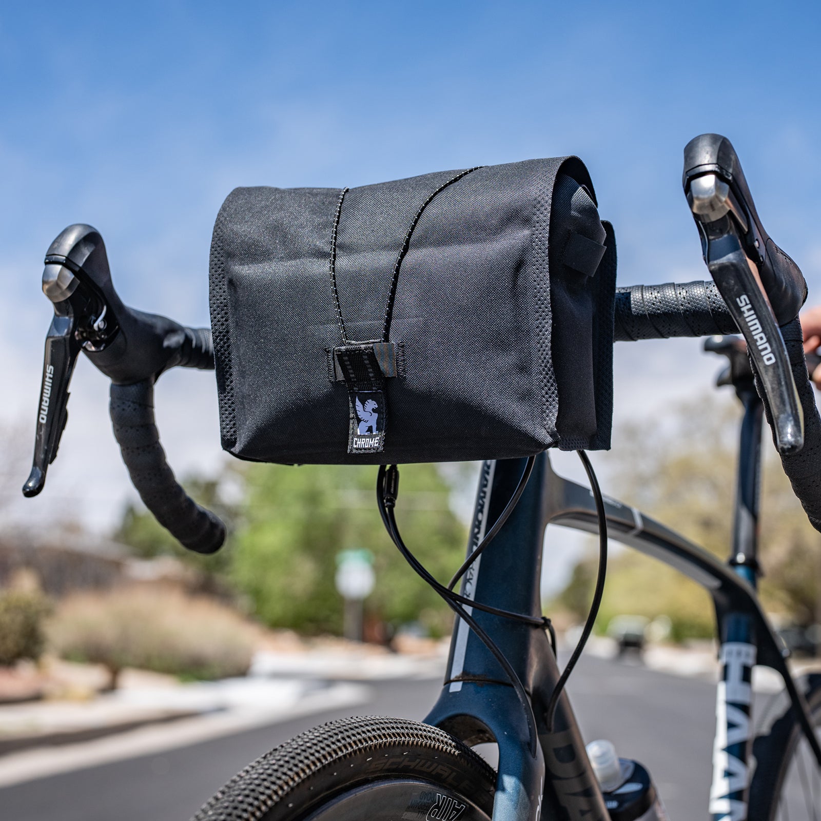 A handlebar bag is an easy and always-there way to haul around my most important repair tools and everyday carry gear.
