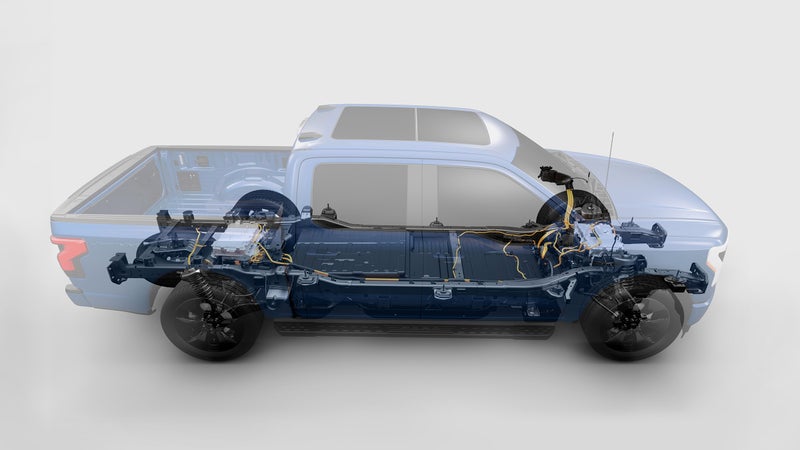 This cutaway illustration shows the mechanical layout of the Lightning’s chassis. One electric motor is located centrally on each axle. The large battery pack, which weighs 1,800 pounds on its own, fits in the space between the axles and frame rails.