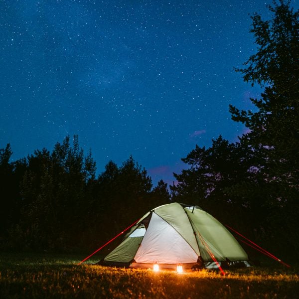 Illuminated Camping Tent At Night