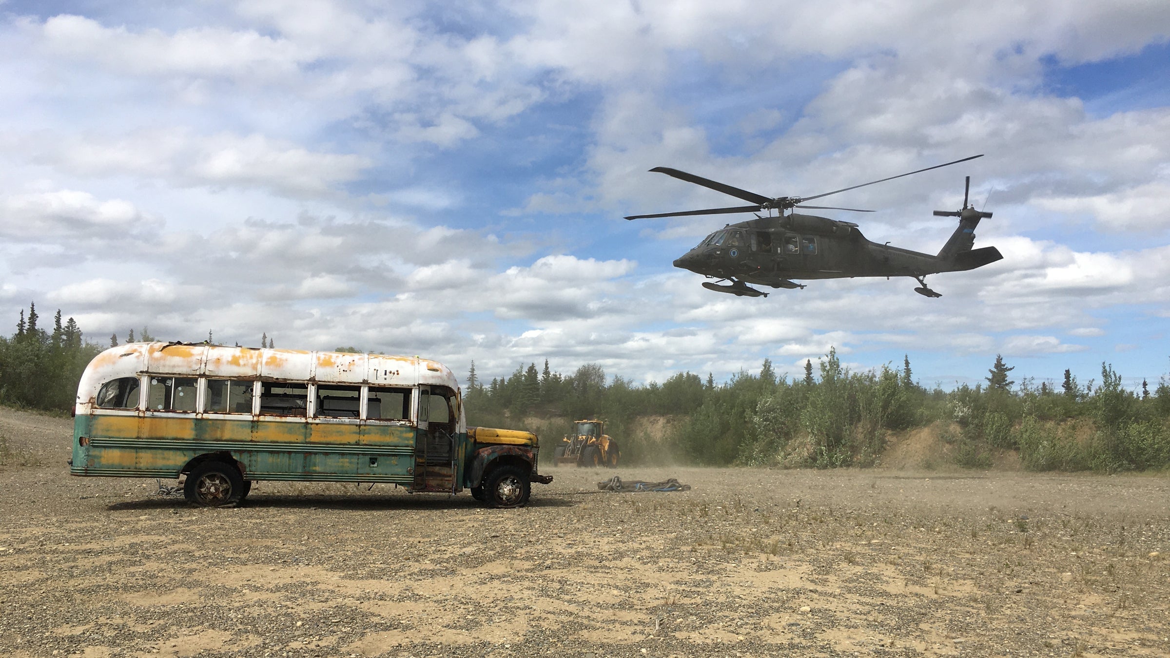 The Alaska Army National Guard transports Bus 142 out of its longtime resting place on the Stampede Trail in Fairbanks.