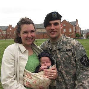 Luke and Amy Bushatz with their newborn son at Luke’s deployment ceremony, May 2009