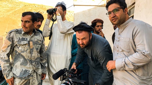Aziz Tassal and Mark Oltmanns filming at frontline Afghan police outpost in Wardak province, August 2020
