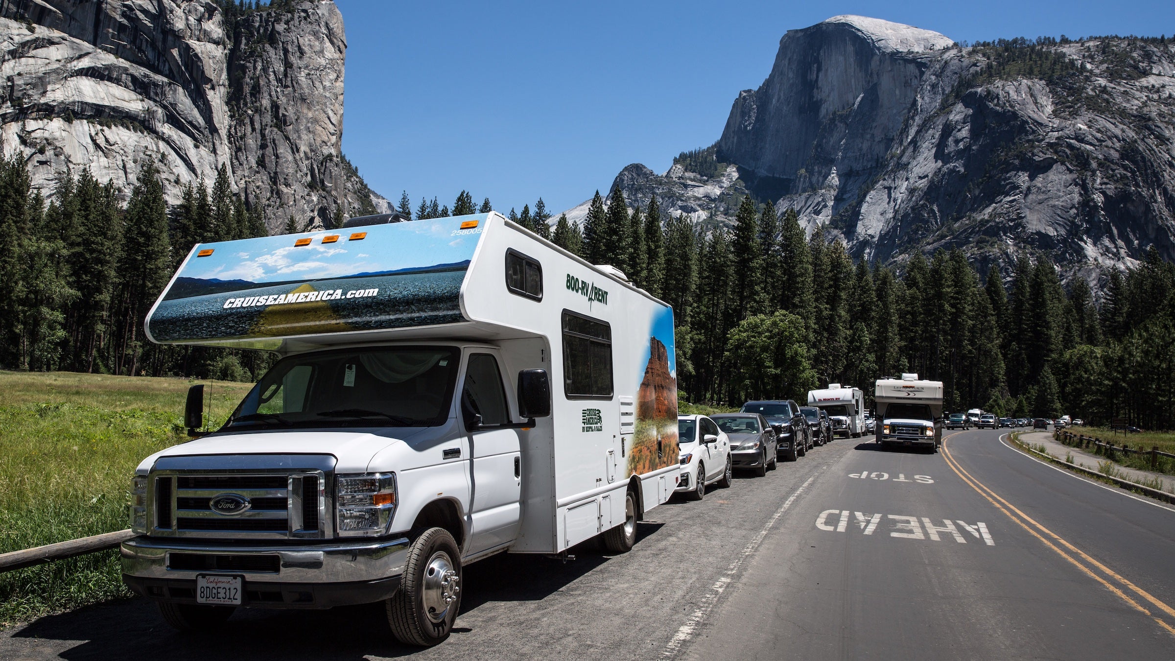 Crowds lined up at Yosemite National park in 2019, before the park's new reservation system was implemented. Yosemite has been one of the few parks to receive more positive reviews on the new process.