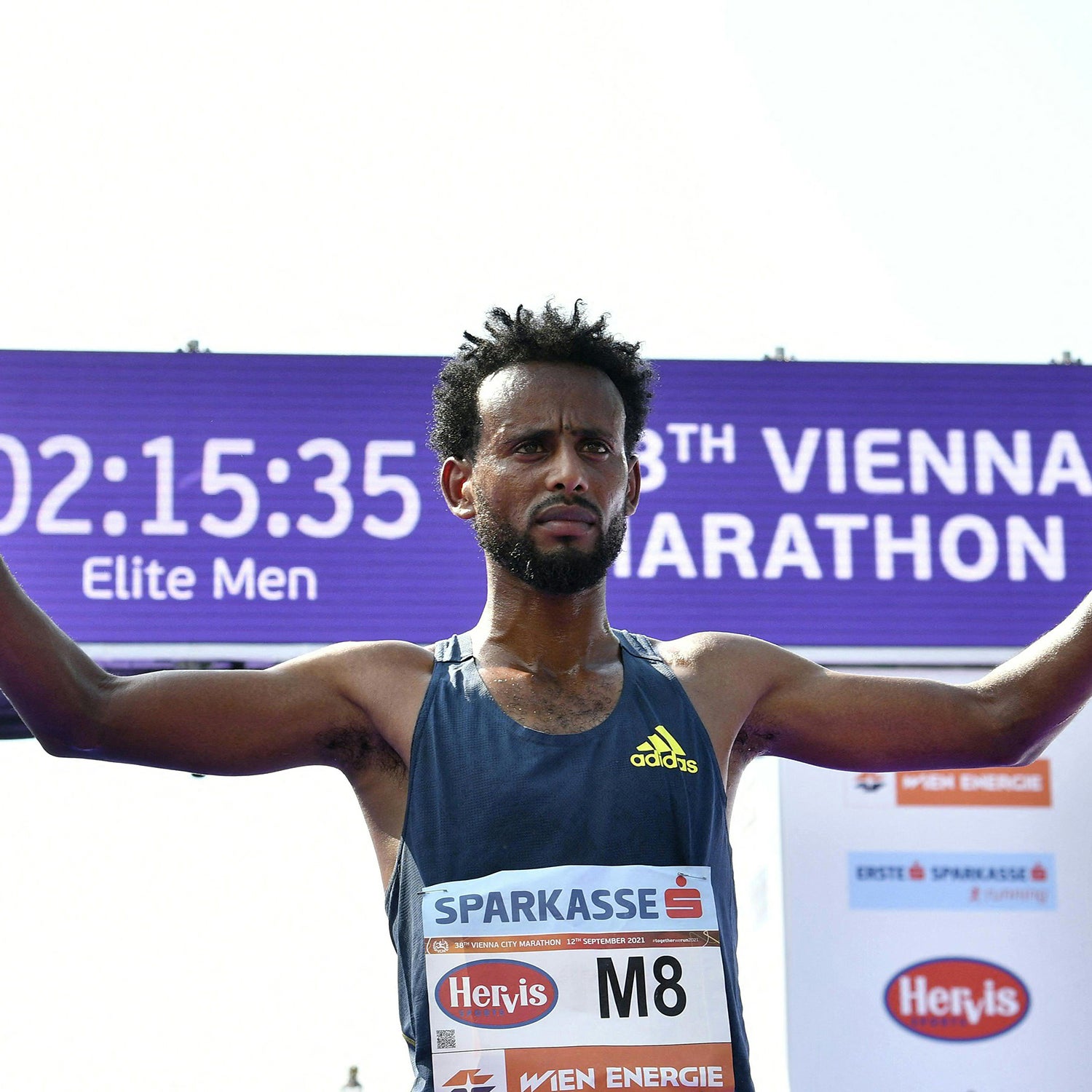 Ethiopia's Derara Hurisa celebrates in the finish area during the 38th edition of the Vienna City Marathon