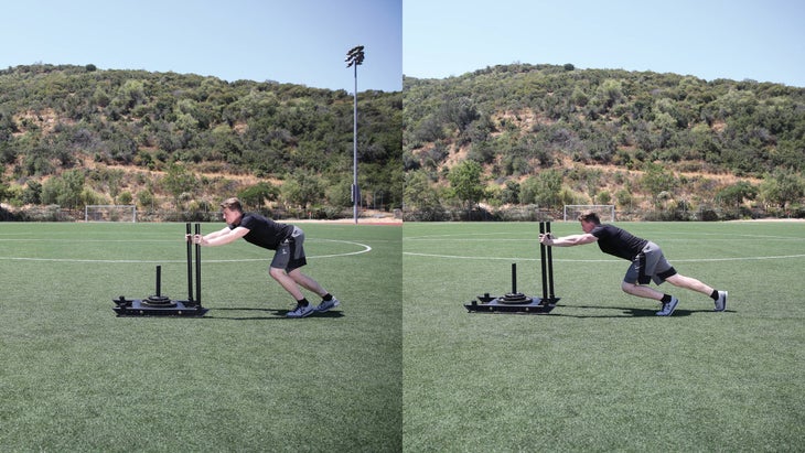 Man pushing a weight sled