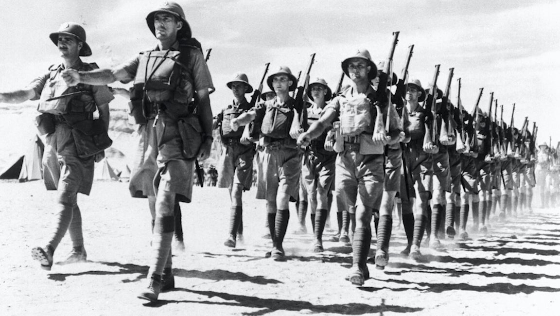 WWII army marching through desert.