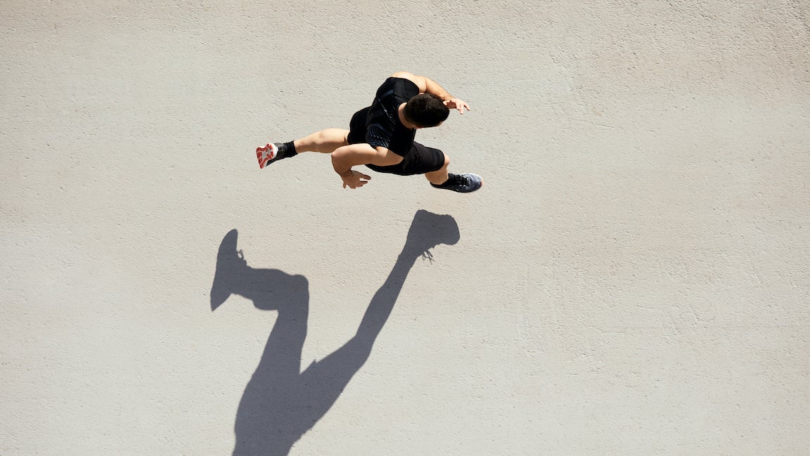 Eagle-eye shot of man running.