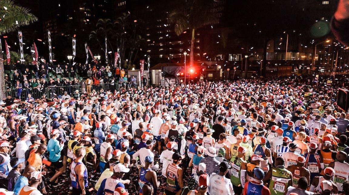 Runners take to the start of the 94th edition of the Comrades Marathon between Durban and Pietermaritzburg in Durban on June 09, 2019.
