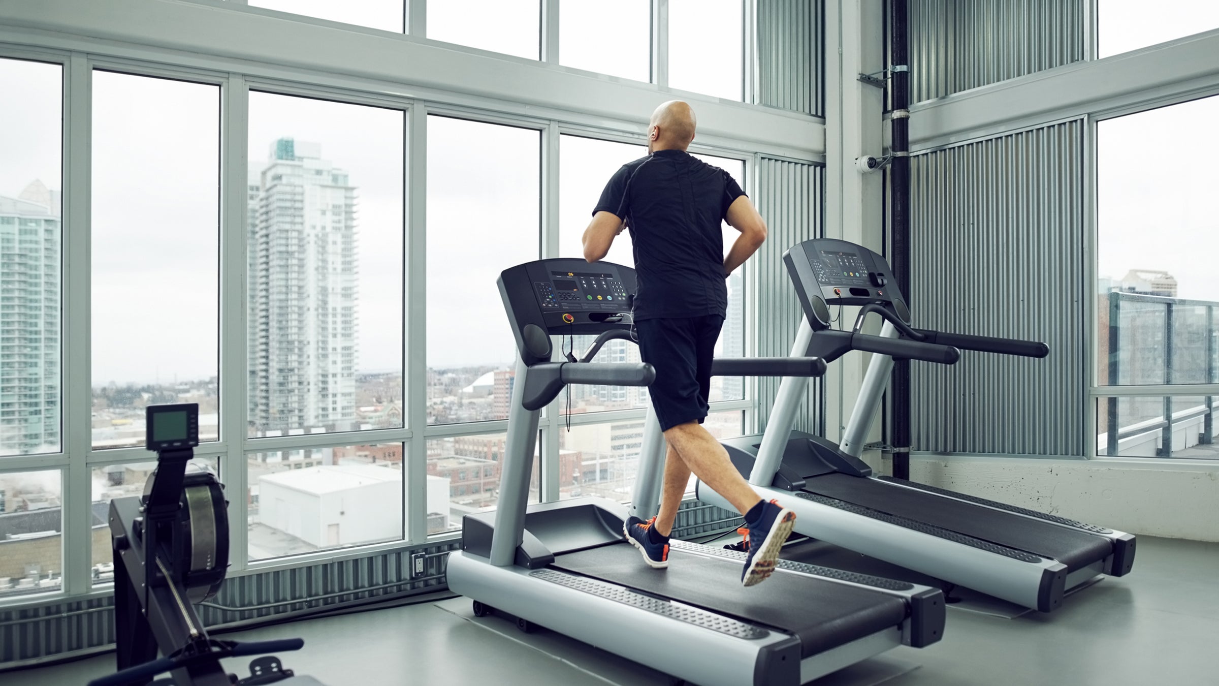 man running on treadmill