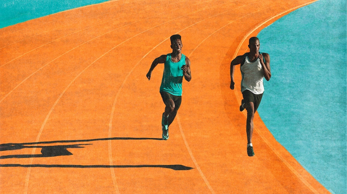 Male runners sprinting on a turquoise and orange track.