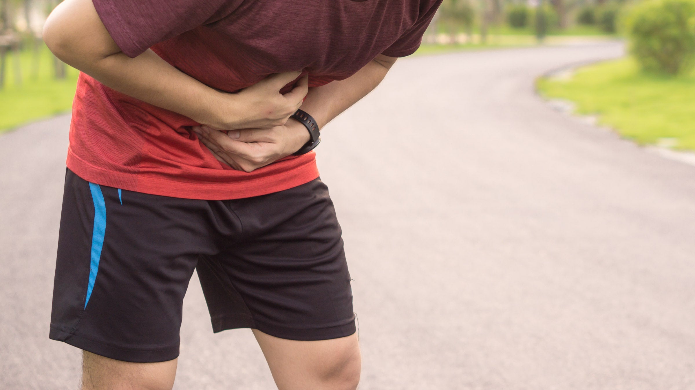 Runner holding abdomen