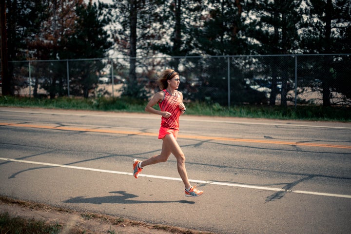 Nuta Olaru running on Boulder roads