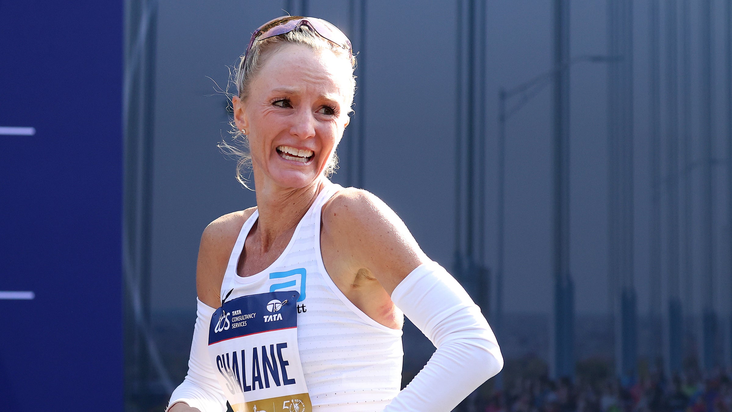 Shalane Flanagan reacts after crossing the finish line during the 2021 New York City Marathon, completing her quest of running all six World Marathon Majors in seven weeks.