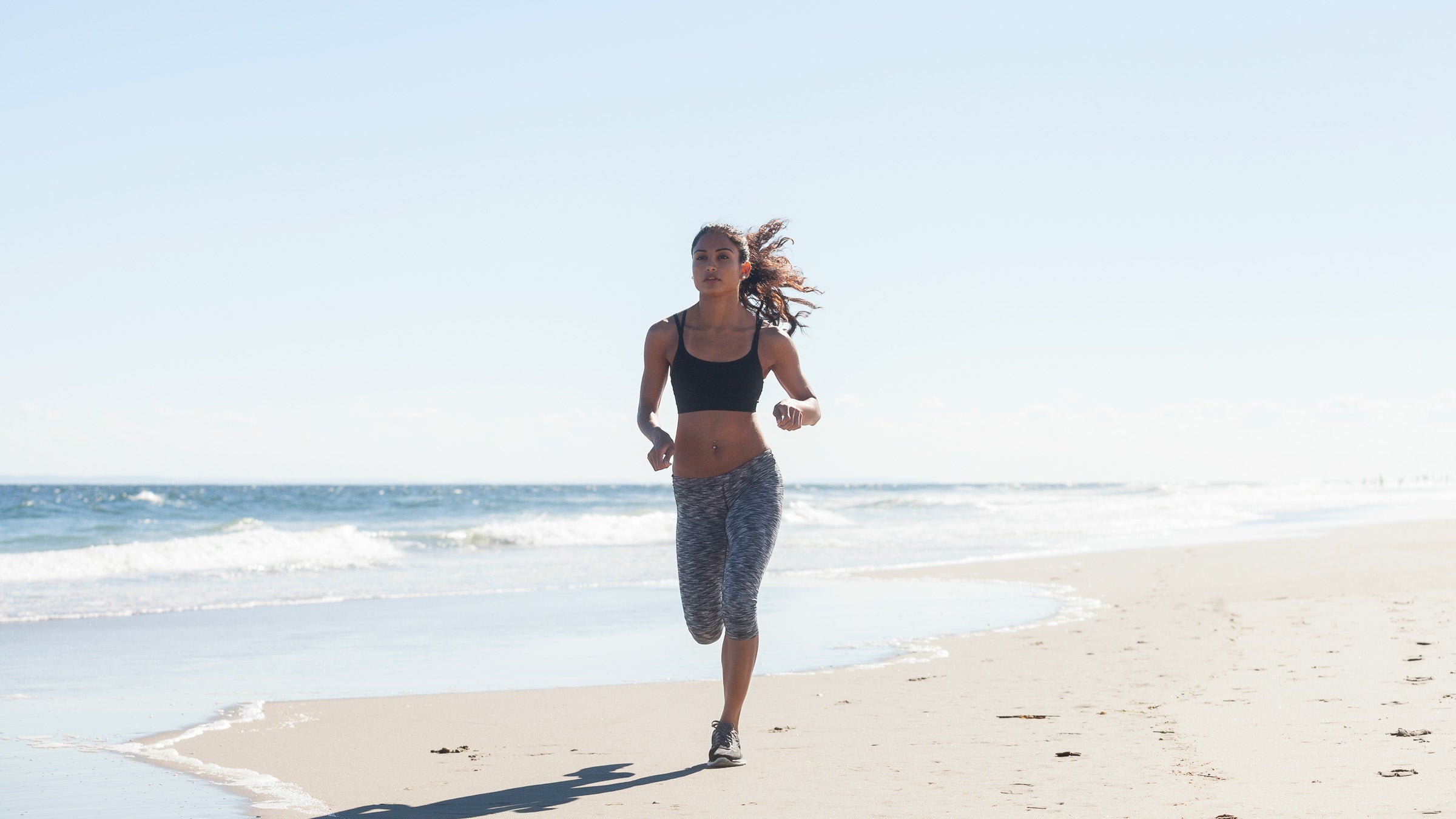Woman running on beach