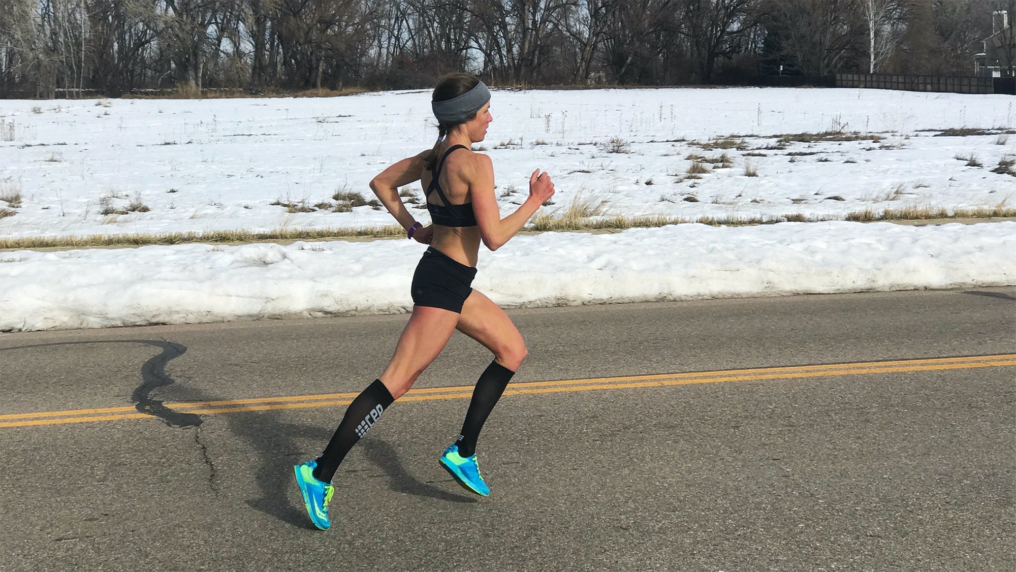 Becky Wade training on road in winter for Olympic Trials
