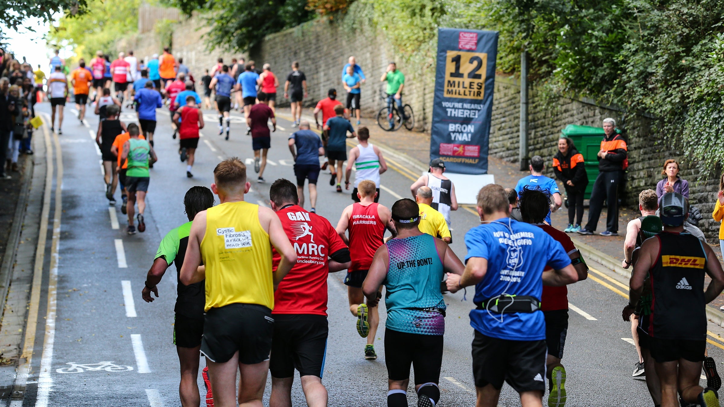 Runners heading uphill in a race