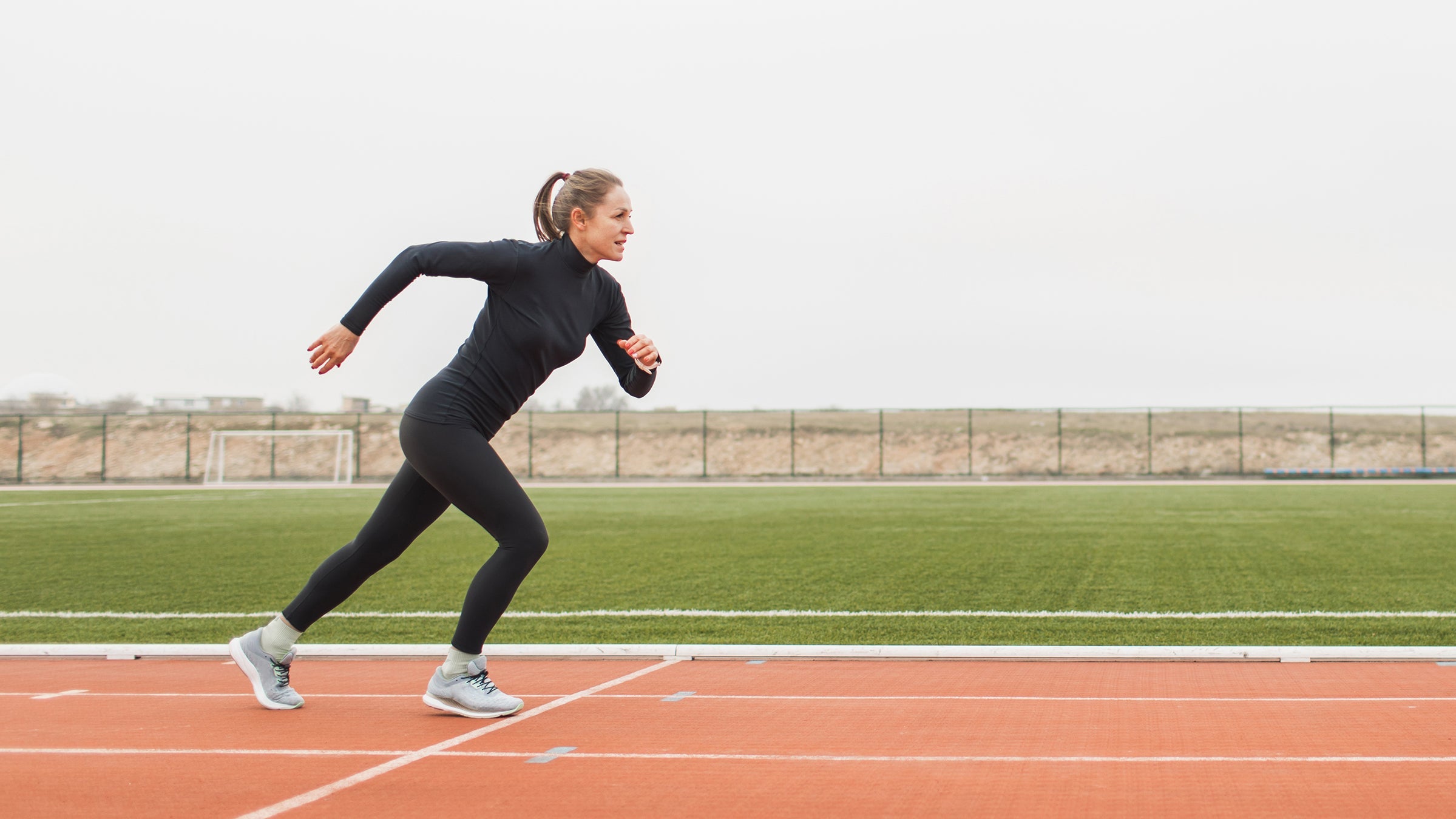 woman starting next interval on track
