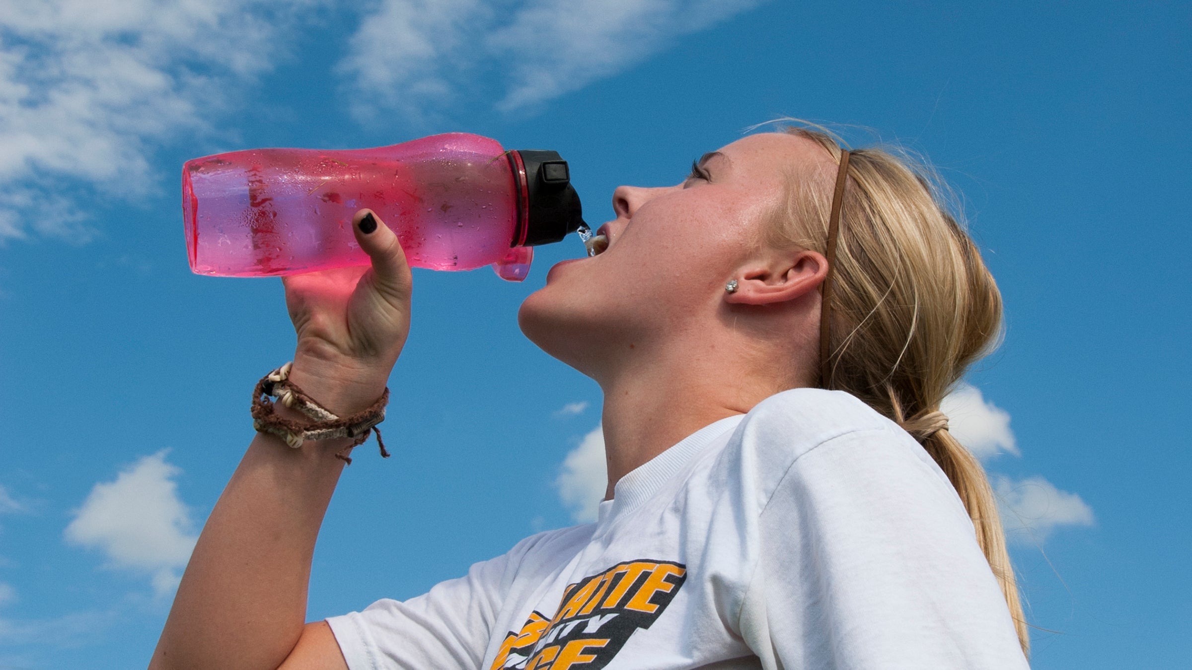 thirsty runner drinking