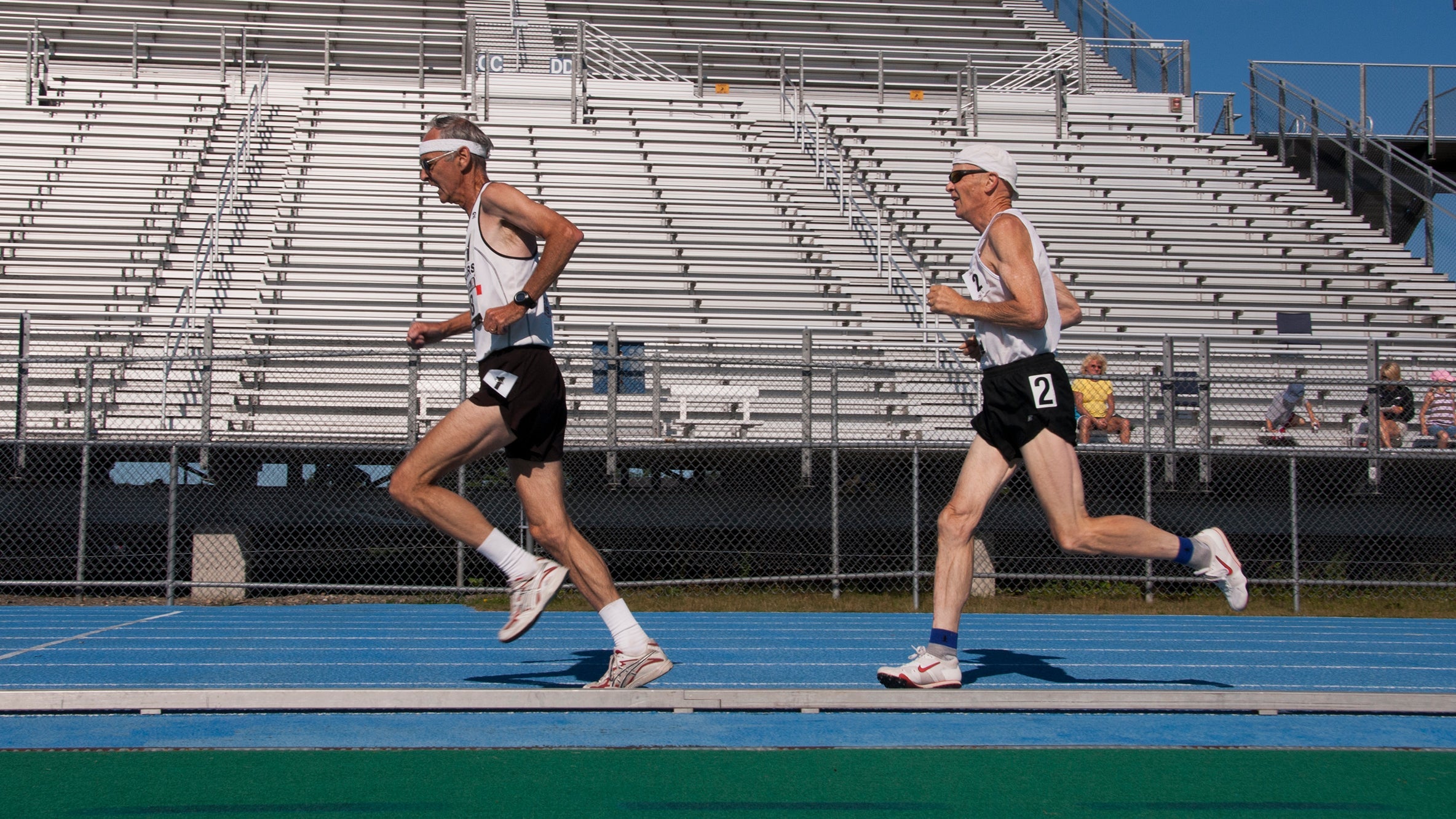 Masters Male Runners on Track