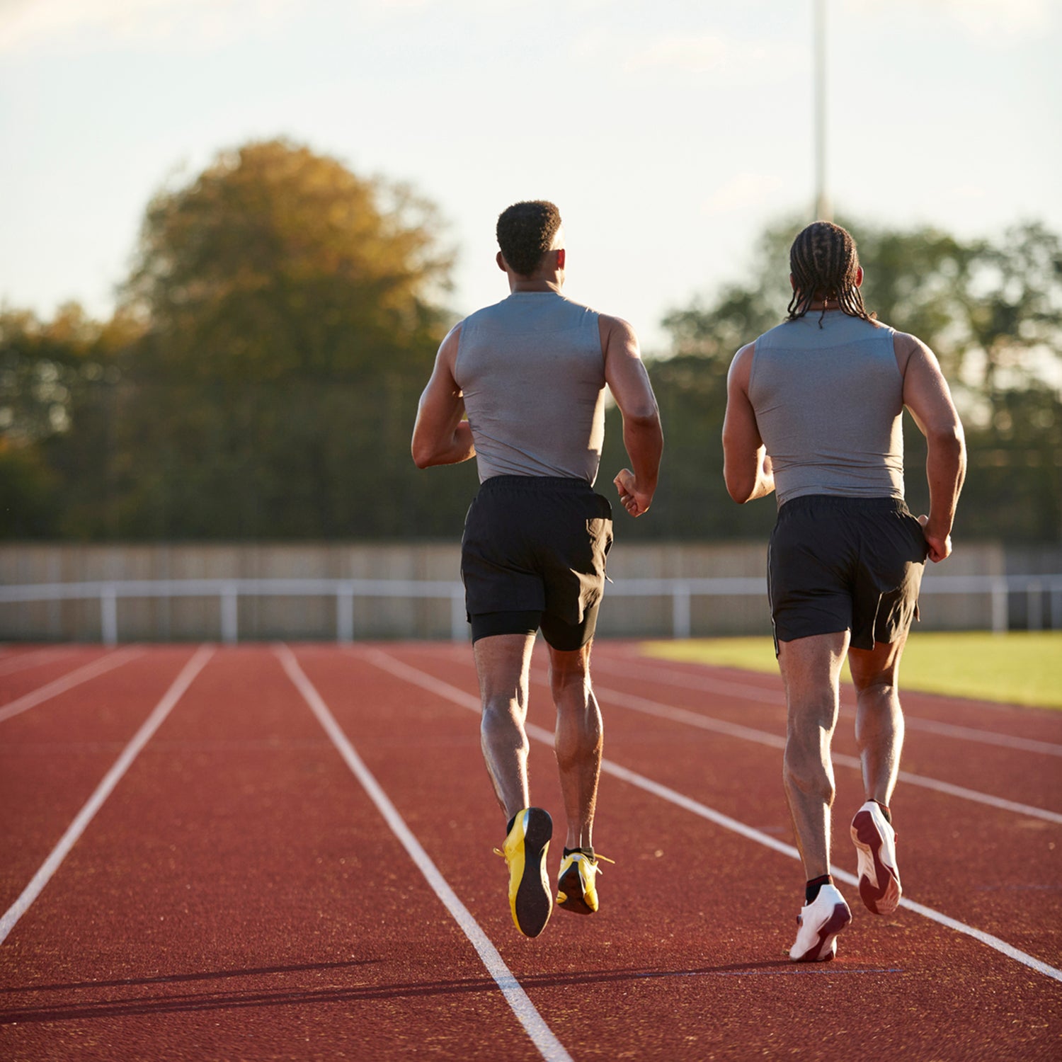 Two runners warming up