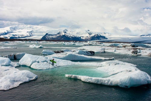Sam Hammer preps for a cold surf in Iceland in 2008.