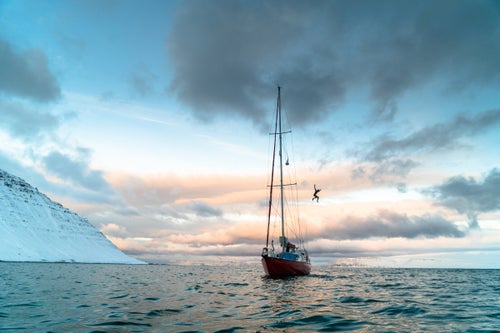 After searching for swell on top of the Aurora, Justin Quintal takes a quick plunge in the Westfjords of Iceland in 2017.