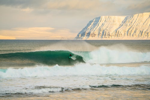 Sam Hammer creeps into the green room off a fjord in Iceland in 2017.